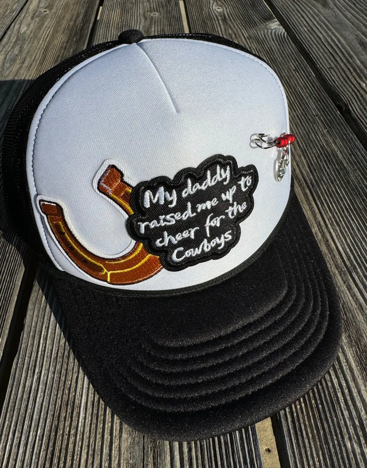 My Daddy Raised Me Up To Cheer On The Cowboys Trucker Hat 1