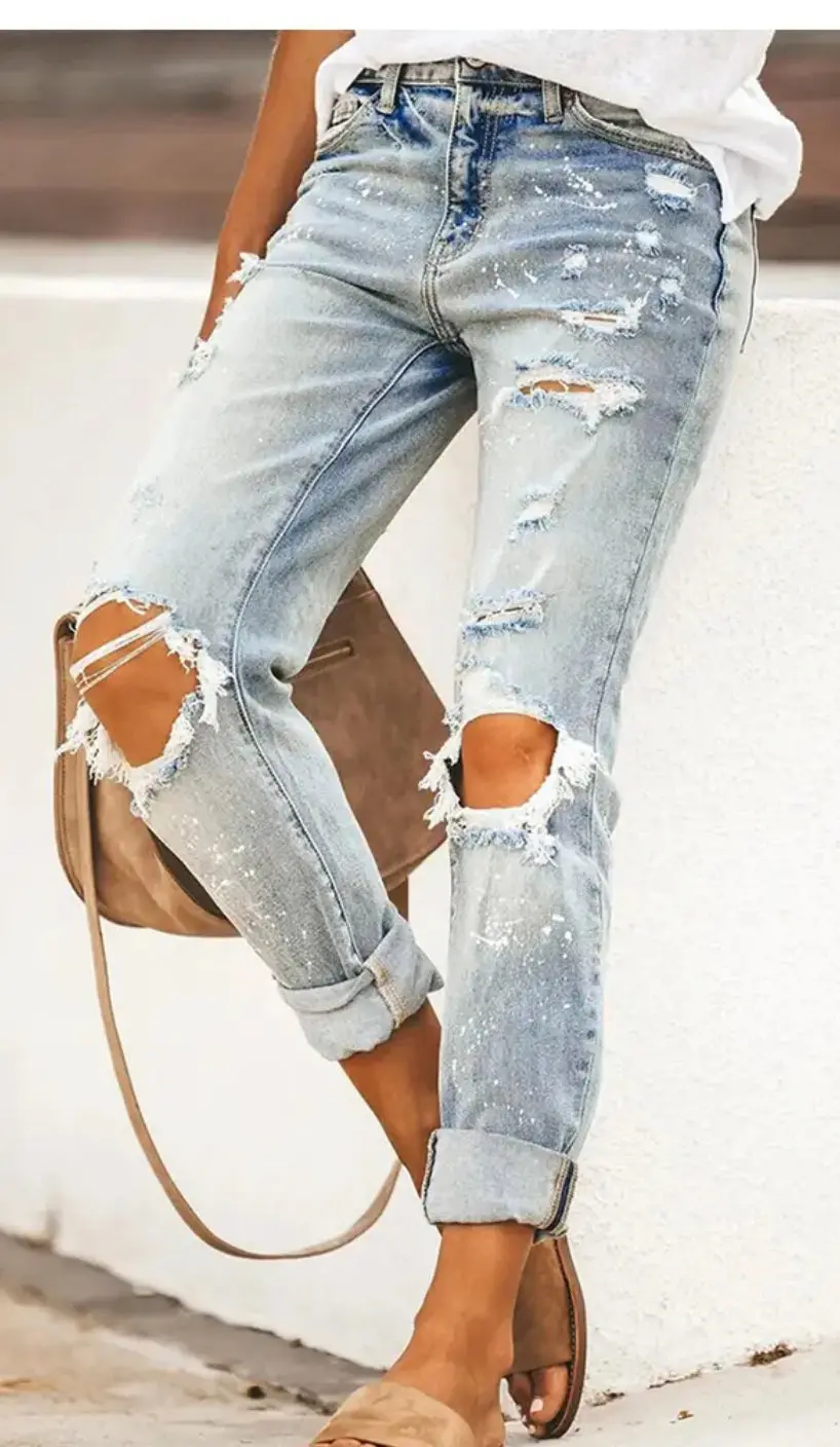 Tattered And Torn Denim Jeans 1